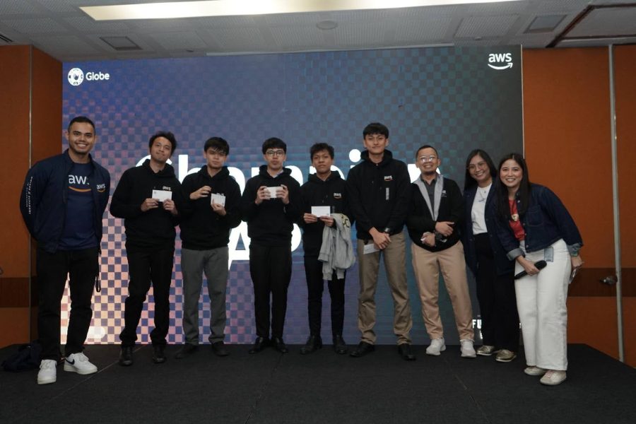 [L-R] AWS Sr. Solutions Architect and event host Francis Valbuena; Globe x AWS Party Rock champions from Asia Pacific College Jacob Angelo De Villa, Brylle Ace M. Nuñez, Danziel Cempron, Michael Vinz Tapiru, and Janson Crisostomo Pagharion; Globe Strategic Analytics Manager Titus Jungao; Globe Solutions Architect Sr. Manager Rhea Lucas; and Globe Data Operations Expert and event host Kit Dela Rosa.